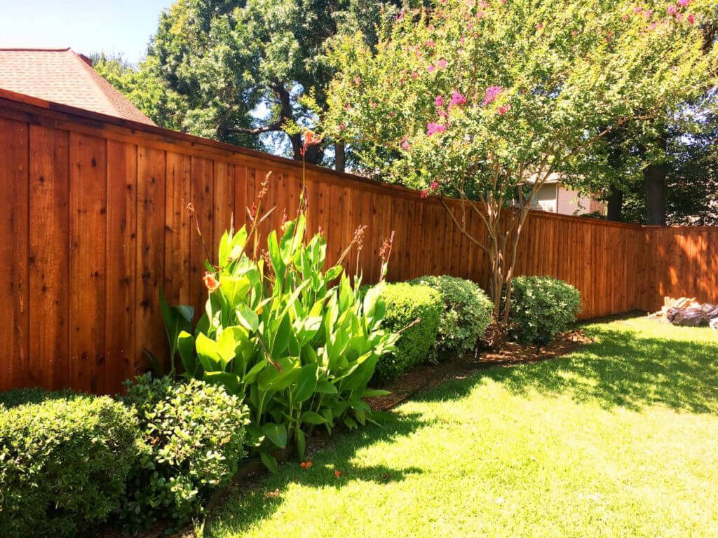 Stained Fence with landscaping